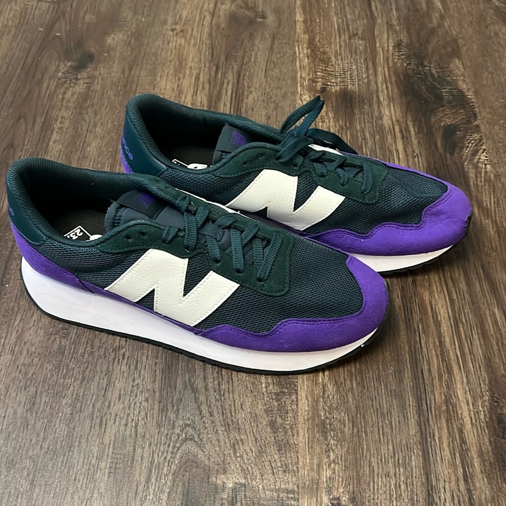 Brand new Men’s NB sneakers. 

Dark Blue and Purple 
Size 10 Men’s